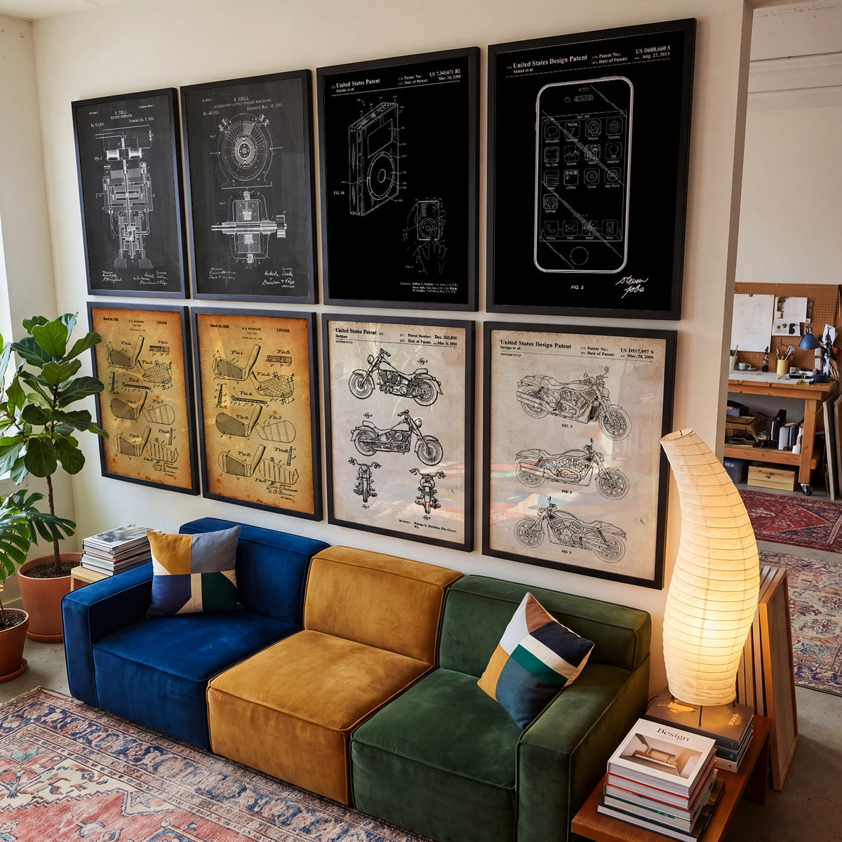 A wall of framed patent prints above a sofa