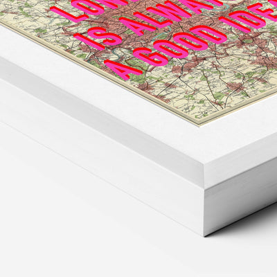White premium box frame corner with a white mount around a vintage map print